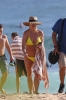 60781919_britney-spears-on-beach-in-a-yellow-bikini-in-hawaii-03-01-2018-024.jpg