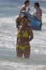 60781933_britney-spears-on-beach-in-a-yellow-bikini-in-hawaii-03-01-2018-043.jpg
